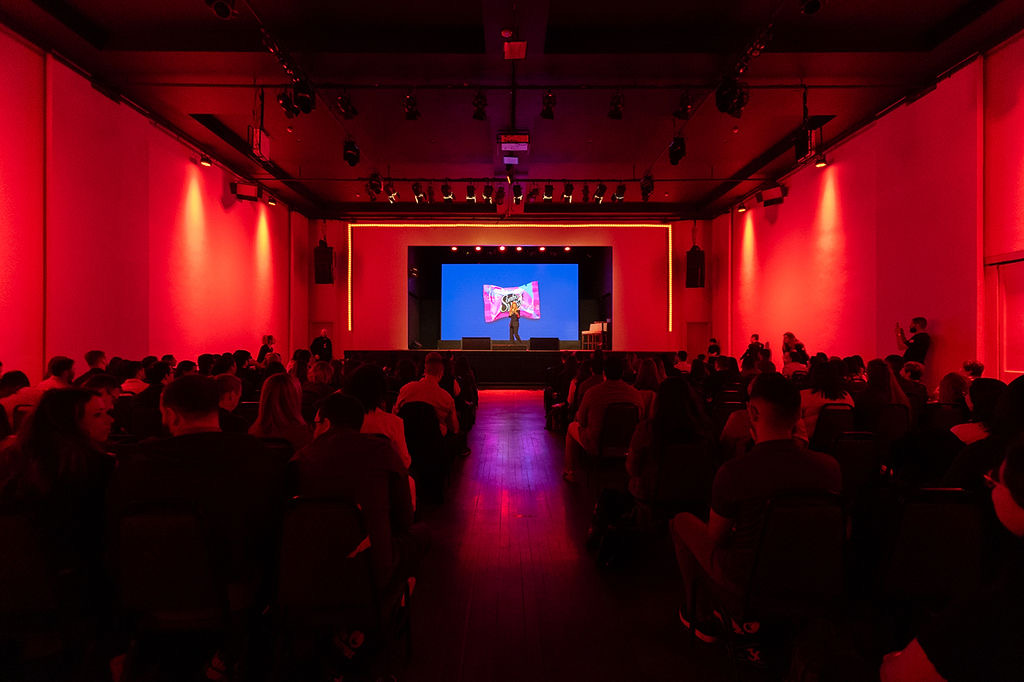 Auditório lotado durante palestra do Tributo em Prosa